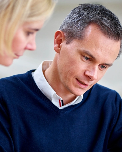 Man and woman using a Tablet together