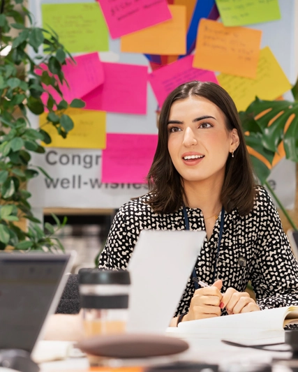 Two women speaking in an office