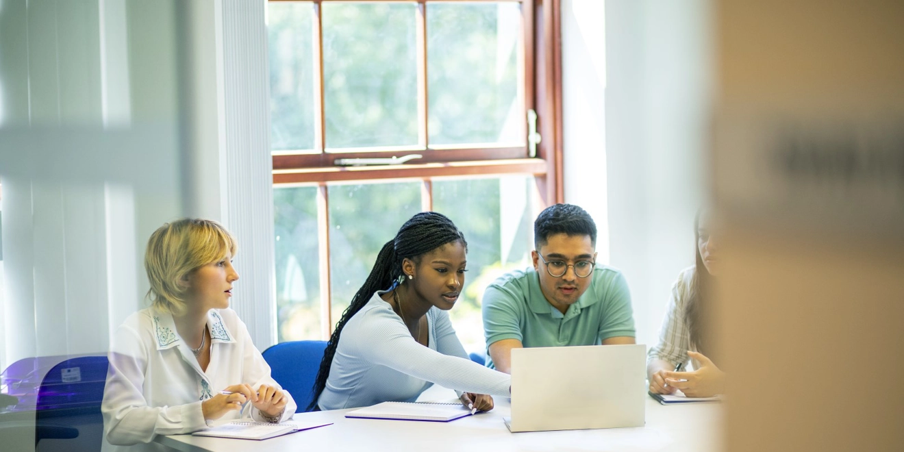 GSK early talent working at a laptop