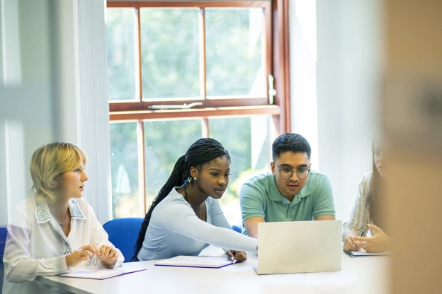 GSK early talent working at a laptop